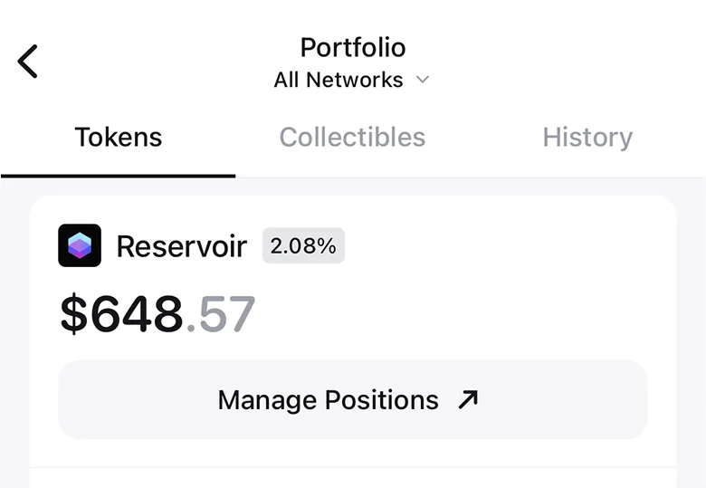 Zerion Wallet portfolio grouped by protocol, showing a Reservoir position worth $648.57 with a Manage Positions link and a liquidity-pool deposit
