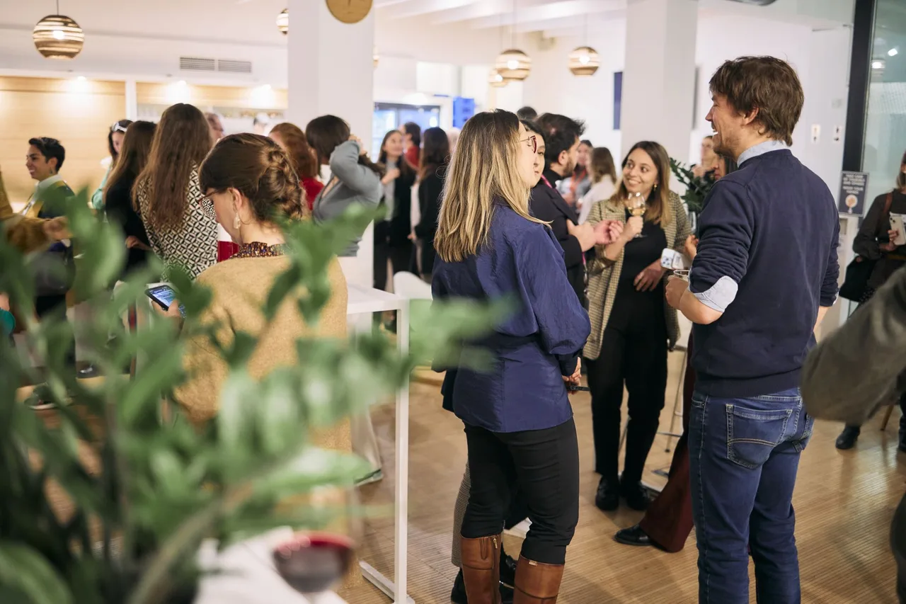 Attendees in discussion at the Zerion legal meetup